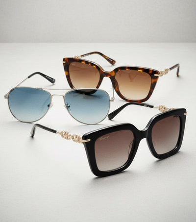 Three pairs of sunglasses with different designs and color schemes on a light gray background.